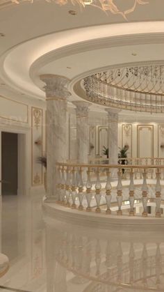 a large circular room with chandelier and marble floors