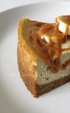 a piece of cake with bananas and caramel drizzled on the top