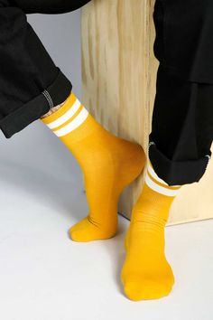 The Jouer is one of our first (and favorite) styles. This men's tube sock is our shorter take on the classic baseball sock—a reimagined retro ankle offered in a variety of colors and made with premium combed cotton and of course terry footing. Size+ OSFA, M 9-12 Design+ 200 Needle+ Reinforced toe & heel+ Seamless toe+ Terry Cushioning on Footbed+ Ankle Content + Care+ Premium Combed Cotton+ Wash Cold/Dry Low+ Imported Sporty Yellow Cotton Socks, Baseball Socks, Ankle Sock, Sock Packs, Clothing Photography, Navy And Brown, Tube Socks, Short Socks, Sport Socks