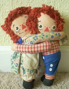 two dolls hugging each other with the caption'see hugs are fine never '