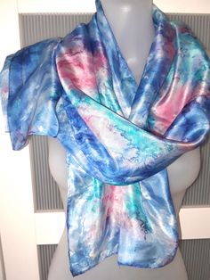 This is such a beautiful tie dye silk scarf featuring the splashes of blue and pink colors. The choice of colors is amazing. It combines dark blue and teal blue colors in a very special way creating the effect sea waves. The scarf is in excellent/mint condition. It has handrolled edges. The scarf can be used as a neck wrap, hair tie, head band and even wrist band. The scarf will make a wonderful gift. the scarf comes in a gift wrap and with a 'Thank you' card. For more scarves in my store visit: Blue Satin Silk Scarf As Gift, Blue Satin Silk Scarf For Gift, Artistic Hand Dyed Blue Silk Scarf, Blue Scarf For Summer Gift, Hand Dyed Blue Silk Scarf For Summer, Blue Hand-dyed Silk Scarf For Summer, Blue Hand Dyed Silk Scarf For Summer, Summer Hand Dyed Blue Silk Scarf, Tie Dye Scarf