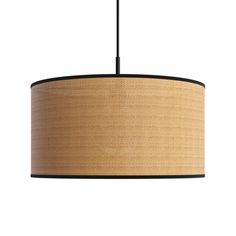 a lamp hanging from a ceiling with a light shade on it's bottom half