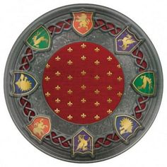 a metal plate with many different colored designs on it