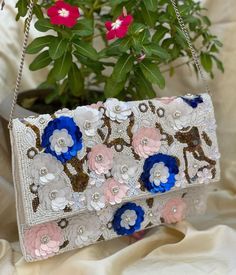 Made up of handmade organic cotton, scattered beads, sequences, and cut glass doesn't look mundane, but when the craftsman starts sewing them together, a masterpiece is formed 🤩! Our beaded beags are the new addition.  Our bags ship within 15 days. White Embellished Festive Bags, White Embellished Bags For Festive Occasions, White Embellished Bag For Festive Occasions, Rectangular Multicolor Sequined Shoulder Bag, Multicolor Hand Embellished Rectangular Bag, Hand Embellished Multicolor Rectangular Bag, Handmade Multicolor Bags For Celebration, White Handwork Rectangular Shoulder Bag, White Rectangular Shoulder Bag With Handwork