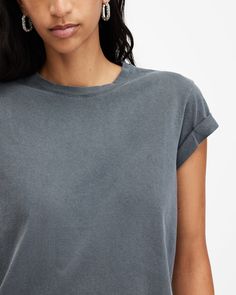 An easy piece, this is the Anna T-Shirt. Crafted from soft organic cotton, it's shaped to a slim silhouette. Featuring turned-up cuffs and our AllSaints signature on the back of the neck. We keep this staple on rotation all year round - make it part of your collection.   This t-shirt is designed to a slim fit Pullover Crew neck Short sleeve Turned up cuffs AllSaints signature logo Everyday Washed Top With Shirttail Hem, Everyday Washed Tops With Shirttail Hem, Washed Tops With Shirttail Hem For Everyday, Basic Washed Organic Cotton Tops, Cotton Washed Tops With Shirttail Hem, Cotton Tops With Shirttail Hem And Washed Detail, Washed Cotton Tops With Shirttail Hem, Everyday T-shirt With Rolled Sleeves And Crew Neck, Basic Soft-washed Top With Shirttail Hem