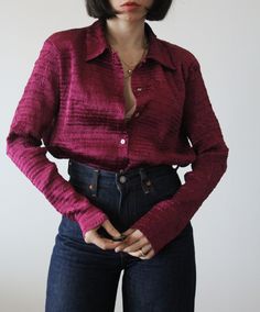 Vintage 90s deep cherry pleated shirt.  Mother of pearl buttons. Made in Italy. Excellent vintage conditions. Shoulder to shoulder 44 cm Bust 55 cm (X2) Length 64 cm Tag size 42 italian (10 uk). Best fit from 8 to 10 uk. Model's size 6/8 uk. Classic Pleated Tops For Fall, Fall Classic Pleated Tops, Classic Collared Pleated Top, Classic Pleated Button-up Top, Classic Pleated Collared Tops, Chic Pleated Button-up Blouse, Vintage Long Sleeve Padded Blouse, Fitted Pleated Button-up Top, Vintage Padded Long Sleeve Blouse