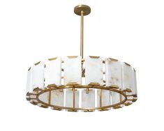 a white and gold chandelier hanging from a ceiling fixture on a white background