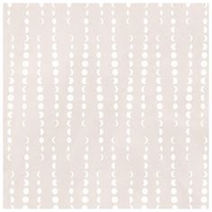 a white wall with circles and dots on it