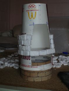 a paper mache made to look like a mcdonald's chair with marshmallows around it