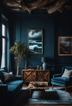 a living room with dark blue walls and wooden furniture in the corner, along with paintings on the wall