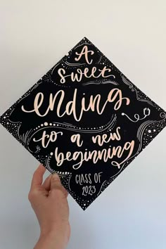 someone holding up a graduation cap that says, a sweet ending to a new beginning class of 2013