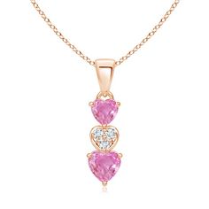 Two pink sapphire hearts are linked by a diamond studded heart motif. The sparkling diamonds beautifully enhance the blossomy pink sapphires. Suspended from a lustrous single bale, this pink sapphire heart pendant is crafted in 14k rose gold. Pink Sapphire Pendant, Gold For Women, Triple Heart, September Birthstone Jewelry, Heart Motif, September Birthstone, Sparkle Diamonds, Birthstone Jewelry, Pink Sapphire