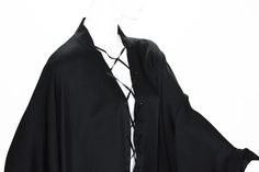 For Sale on 1stDibs - Very Rare Tom Ford for Gucci Silk Black Lace-Up Kimono Top F/W 2002 Runway Collection Designer size - 40 ( will fit most because of style ) 100% Silk, Elegant Gucci Blouse For Evening, Gucci Luxury Formal Blouse, Luxury Gucci Blouse For Formal Occasions, Luxury Formal Gucci Blouse, Luxury Formal Blouse By Gucci, Gucci Evening Long Sleeve Tops, Gucci Long Sleeve Evening Tops, Gucci Designer Tops For Formal Occasions, Designer Gucci Tops For Formal Occasions