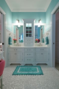 a bathroom with blue walls and white cabinetry has a red arrow pointing to the wall color - nice