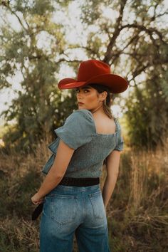 This tiered denim top is one we can't stop obsessing over! Washed denim Layered ruffle blouse Smocking back 80% cotton 20% polyester Model is 5'7" and wearing a size small. Small: 2-4 Medium: 6-8 Large: 10-12 Stop Obsessing, Washed Denim, Denim Top, Denim Wash, Smocking, Ruffle Blouse, How To Wear