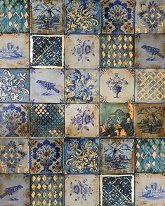 blue and white tiles with birds on them are arranged in an intricate pattern, which is very decorative