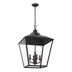 a black lantern hanging from the ceiling with three lights on each side and one light at the end