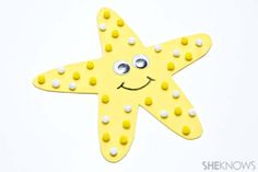 a yellow starfish with white dots on it's face and eyes is shown in the shape of a smiley face