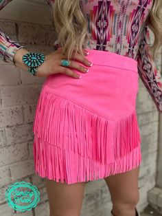 Saddle up for rodeo season with our Fort Worth Fringe Mini Skirt! Featuring a fun and flirty pink fringe design, this mini skirt also has built-in shorts for comfort and convenience. Don't miss out on the fringe trend and add this skirt to your wardrobe today! Western Skirts, Getting Ready To Move, Red Fringe, Color Party, Rodeo Outfits, Fringe Skirt, Beauty Collection, Dress Romper, Fort Worth