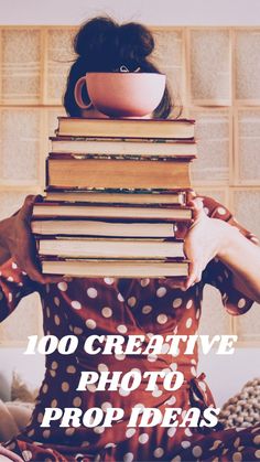 a woman holding a stack of books with the words, 100 creative photo prop ideas