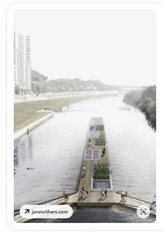 an aerial view of a waterway with people walking on it