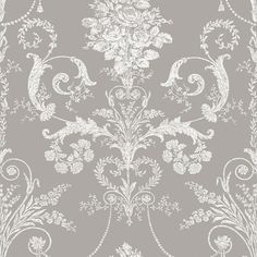 a gray and white wallpaper with floral designs on the side, in an ornate pattern