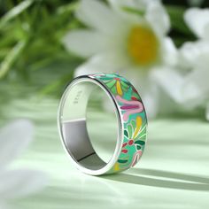 Add a serious dose of radiance to your outfit with splash of color! Bright and whimsical, the silver enamel band ring makes a statement with any outfit. Combine this trendy piece with other enamel pieces to vibrant and radiant effect. Enjoy the benefits of it, such as brining good luck and love, enhancing health and beauty.Weight: 5.84 gWidth: 7.2 mmHeight: 1.7 mmThickness: 1.6 mmMaterial: 925 SilverPlating Color: Silver Enamel Jewelry For Spring Gifts, Spring Enamel Jewelry For Gifts, Spring Enamel Jewelry As Gift, Hand Painted Jewelry As Spring Gift, Hand Painted Jewelry For Spring Gift, Spring Gift Enamel Jewelry, Spring Multicolor Hand-painted Jewelry, Multicolor Enamel Ring As A Gift, Hand Painted Jewelry For Spring