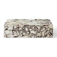 a white and brown marble box on a white background