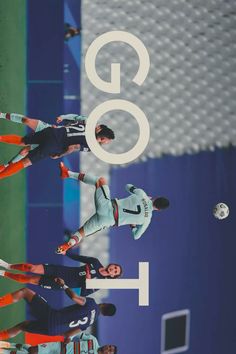 three men are playing soccer in front of the google logo on a wall with words above them