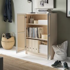 a book shelf with books and other items in it