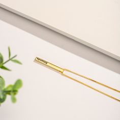 DESCRIPTION Add something extra special to your jewelry box with this Selenichast Engraved 3D Bar Name Necklace. It features smooth edges with a slight curve for comfortable touch. Engrave just your name on one side, customize with two names or even some inscriptions you love on all four sides - you name it! This morden classic piece is also a very thoughtful and appreciated gift for friends and family. DETAILS Plating: 18K Gold Materials: 18K Gold on Silver Measurements: Length: 18.0"(45.72cm) Adjustable Engraved Gold Name Necklace, Gold Engraved Rectangular Name Necklace, Gold Engraved Rectangular Pendant Name Necklace, Custom Name Rectangular Pendant Bar Necklace For Personalized Gift, Personalized Name Rectangular Pendant Bar Necklace, Simple Gift Wrapping, Golden Necklace, Smooth Edges, Simple Gifts