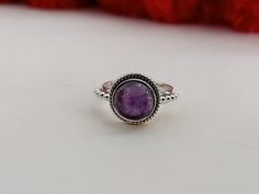 Handmade Amethyst silver ring , you can wear this ring as a party wear ring .. Title - Amethyst silver ring Stone color - purple Stone shape - round Material - Sterling silver 925 Note - We use natural gemstones, so color shade may be little bit different .. we are giving you best quality rings on best price .. contact us for more quantity Bohemian Rings With Bezel Setting, Adjustable Amethyst Ring With Natural Stones, Amethyst Ring With Natural Stones For Healing, Amethyst Promise Ring With Natural Stones, Bohemian Amethyst Crystal Ring, Adjustable Amethyst Ring With Stone Setting, Amethyst Crystal Ring With Natural Stones, Sterling Silver Amethyst Ring For Healing, Sterling Silver Amethyst Ring With Natural Stones