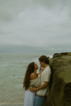 Couple in love dreamy on the beach El Matador Beach Engagement Photoshoot, San Diego Couple Pictures, Couple Hawaii Photoshoot, San Diego Couples Photoshoot, Ocean Couple Pictures, Couple Beach Pictures Romantic, Couple Shoot Poses Romantic, Dreamy Couples Photography, Couple Film Photography