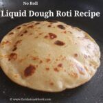 a close up of a pizza on a pan with the words liquid dough roti recipe