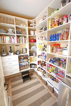 an open pantry with lots of food in it