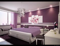 a bedroom with purple and white decor in the corner, along with a chandelier hanging from the ceiling