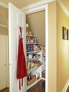 an open pantry door with food in it