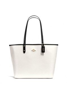 Coach Reversible City Tote With Travel Pouch White Reversible Shopping Bags, White Reversible Bags For Shopping, Luxury Reversible Tote Bag, On-the-go Shoulder Bag With Snap Closure, Reversible Coated Canvas Bag For Everyday Use, White Reversible Bag For Everyday Use, Everyday Reversible Coated Canvas Bag, Reversible Coated Canvas Tote Bag, Reversible Coated Canvas Everyday Bag