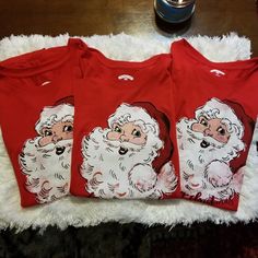 Three Red Christmas Tee Shirts With Santa On The Front With "Merry Christmas" Right Under. I Have 1 Size Small 4-6 And 2 Large 12-14. Nwt Christmas Tee Shirts, Santa Shirt, Santa Shirts, Holiday Time, Christmas Tees, Red Christmas, Merry Christmas, Tee Shirts, Womens Tops