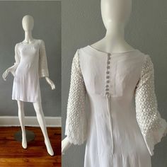 V I N T A G E 1960s . fully lined . scoop neckline . empire waistline . buttons to mid back with a zipper . crochet lace bell sleeves . no stretch . mini length C O L O R S . white M A T E R I A L . cotton L A B E L . handmade C O N D I T I O N . excellent  S I Z E . tag size // n-a . recommended size // s M E A S U R E M E N T S (garment not stretched) . shoulders // 13 . chest // 32 . waist // 28 . hips // 36 . length // 35 . sleeves // 20.5 ** all items were measured laid flat & measurements for chest, waist, & hips have already been doubled ** Chic White Bell Sleeve Mini Dress, Bell Sleeve Mod Dress, Wedding Mini Dress, Zipper Crochet, White A-line Mini Dress In Mod Style, 60s Wedding Dress, 1970s Fitted White Dress, 1960s White Mini Dress, Wedding Dresses 60s