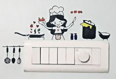 a woman is cooking in the kitchen with utensils on the wall behind her