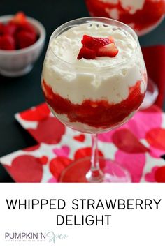 whipped strawberry delight in a wine glass with strawberries on the rim and text overlay