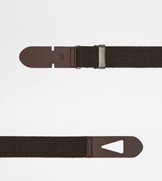 Tod's Greca Belt, adjustable belt crafted in canvas with particular leather snap buckle with stamped monogram and branded metal details. Italian Luxury, Adjustable Belt, Kuwait, Luxury Shoes, Singapore, Buckle, Monogram, Australia, Canvas