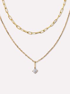 Your new favorite way to layer. This diamond necklace set is crafted in solid gold with a waterproof design that’s made to last a lifetime. Featuring a classic chain necklace and paperclip chain with a lab-grown diamond charm, this trio is a chic set you can wear everyday. Add our Gold Paperclip Bracelet to your wrist to complete your look. The Gold Diamond Layered Necklace includes three pieces: Gold Paperclip Chain Necklace - Gold Paperclip Necklace, Dainty Gold Necklace - Gold Chain Necklace, and Gold Pendant - Gold Diamond Charm. • Crafted in recycled solid gold • Waterproof & tarnish-free • Set featuring two necklaces & one lab-grown diamond charm Gold Paperclip Necklace, Paperclip Bracelet, Paperclip Necklace, Diamond Necklace Set, Dainty Gold Necklace, Gold Diamond Necklace, Diamond Charm, Pendant Gold, Necklace Dainty