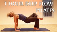 a woman doing a yoga pose with the words, 1 hour deep flow pilates