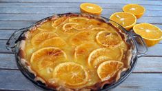 there is a pie with orange slices on it