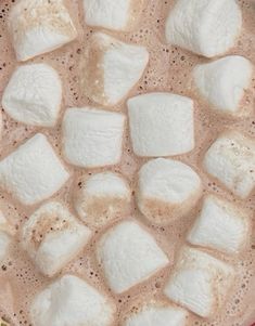 there are marshmallows on top of the hot chocolate