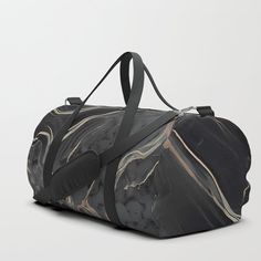 No need to muffle your duffle game. Our duffle bags are sure to be your new favorite gym and travel go-to, featuring crisp printed designs on durable spun poly fabric for a canvas-like feel. Constructed with premium details inside and out for ultimate protection and comfort. Available in three sizes.       - Crafted with durable spun poly fabric for high print quality    - Soft polyester lining with interior zip pocket    - Adjustable shoulder strap with foam pad and carrying handles    - Double Duffle Bag Patterns, Black Duffle Bag, Darkest Black Color, Travel Duffle Bag, Travel Duffle, Duffle Bag Travel, Duffle Bags, Stone Pattern, Marble Stone