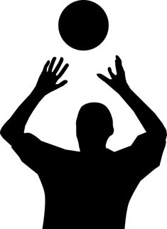 the silhouette of a man reaching up to catch a ball with his hands while standing in front of him