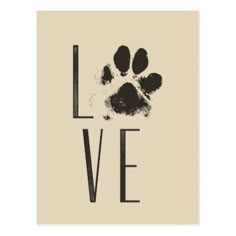 an animal paw print with the word love written in black ink on a beige background